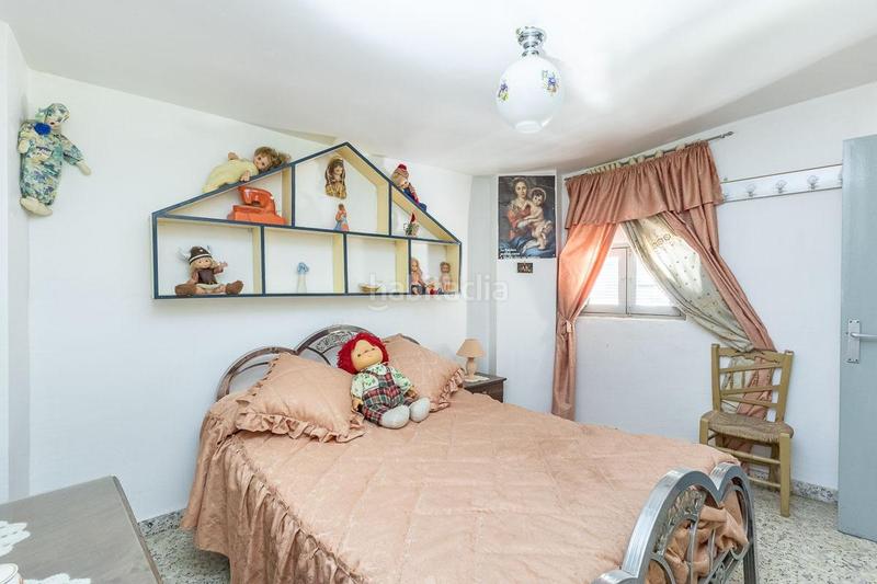 Foto 76ca00f5-dc04-4060-a14d-de2aea7cf2e4. Casa aparellada a Güéjar Sierra