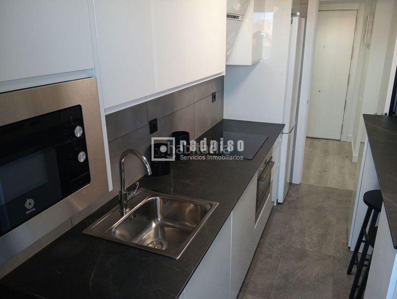 Foto bb4cee2b-d2db-4f71-858f-d1864adbade8. Lloguer pis amb calefacció piscina a Rejas Madrid