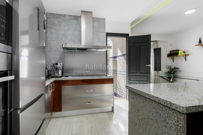 Foto 02c92e06-237d-4a7d-8844-79530bef1b66. Casa adossada a Cervantes Granada