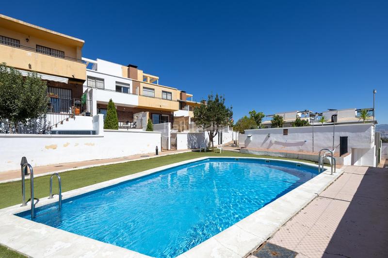 Foto 04065d3b-2c3b-4188-b2dc-dc5447e84aad. Casa adossada amb calefacció aparcament piscina a Gabias (Las)