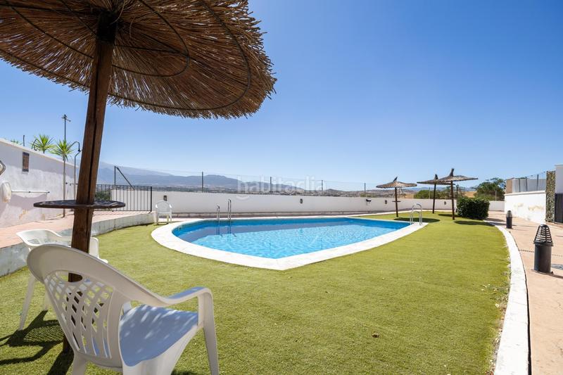 Foto 29bead29-a82a-42a1-adcb-297c02e45d24. Casa adossada amb calefacció aparcament piscina a Gabias (Las)