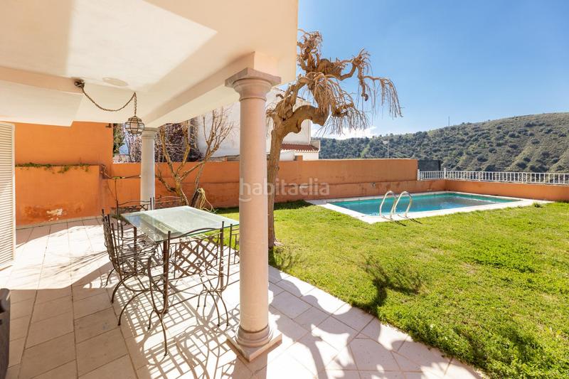 Foto fe96bd7f-8e5f-401c-9539-e4513185ee82. Casa amb calefacció aparcament piscina a Crta. De la Sierra Granada