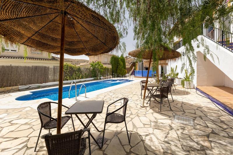 Foto 2ea7efc6-cd92-490b-ac73-d70592cdbd60. Semi detached house with heating parking pool in Crta. De la Sierra Granada