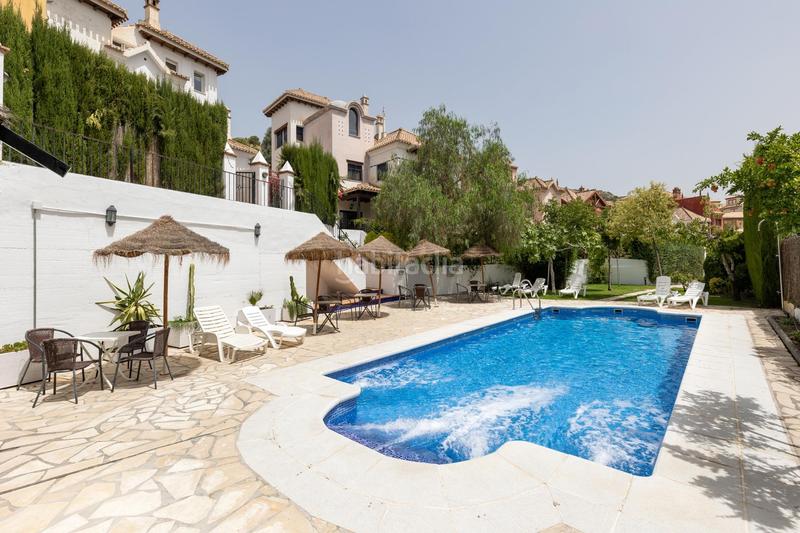 Foto c5a19052-3347-49b6-bb6e-84cca6650faa. Semi detached house with heating parking pool in Crta. De la Sierra Granada