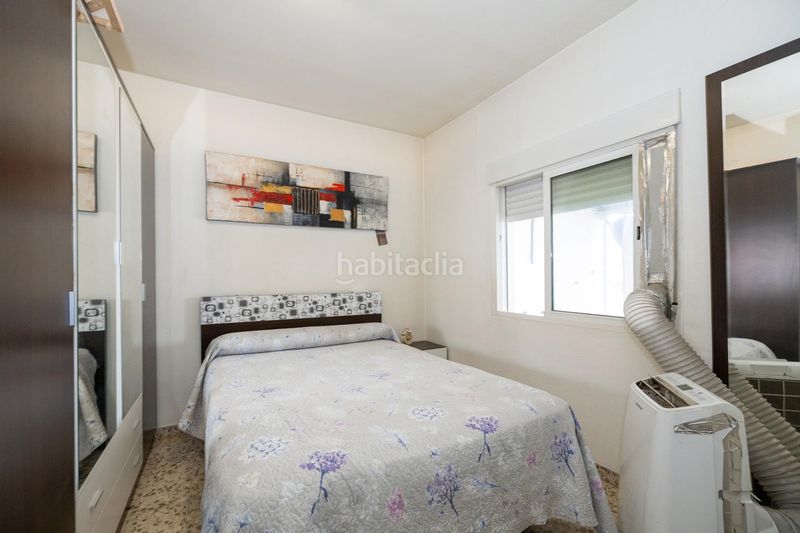Foto f1e8e330-4a0e-490d-a5c4-448e4c90e9a6. Casa adossada amb aparcament a Atarfe