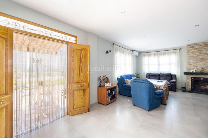 Foto abbdee3d-2e1d-4f5b-a086-637776f911d9. Casa espectacular casa independiente con piscina y opcion de terreno urbanizable 2000m2 en Atarfe