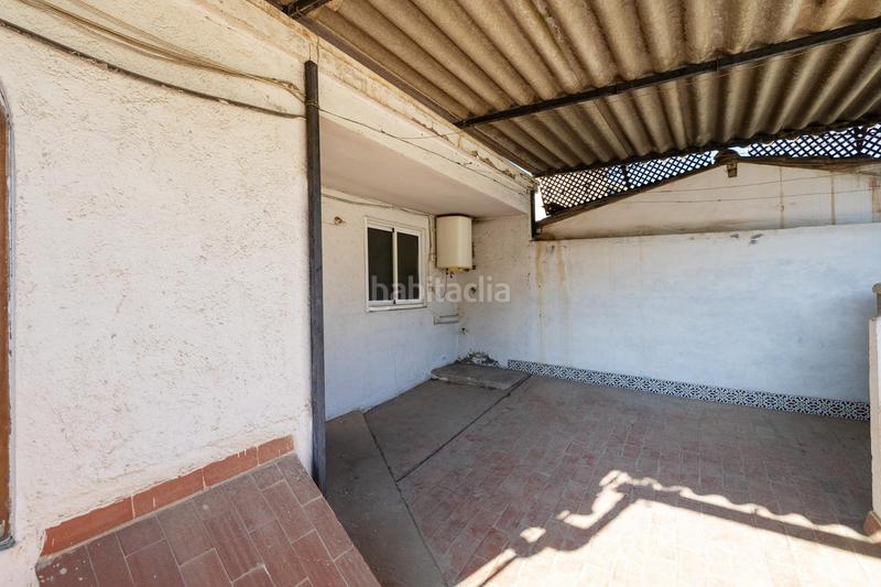 Foto 1571d321-ad48-4617-93aa-f8c162de226d. Casa adosada casa con encanto a reformar en plena cuesta del chapiz. patio, varias terrazas y mucho más en Granada