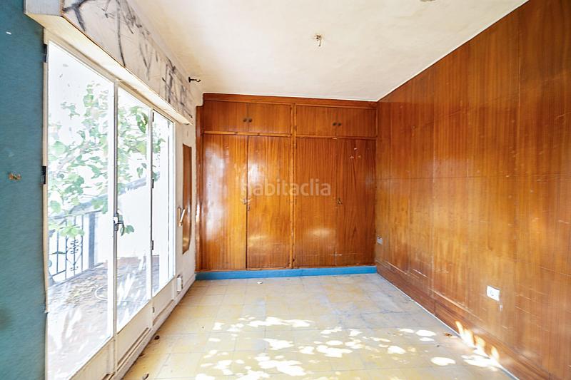 Foto 1c02df41-94ec-4e05-9ede-3dd2788467c9. Casa adosada casa con encanto a reformar en plena cuesta del chapiz. patio, varias terrazas y mucho más en Granada