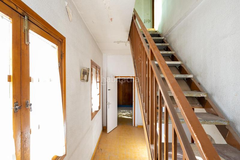 Foto 3a019824-8e88-44dd-b803-51fd876cfc6a. Casa adosada casa con encanto a reformar en plena cuesta del chapiz. patio, varias terrazas y mucho más en Granada