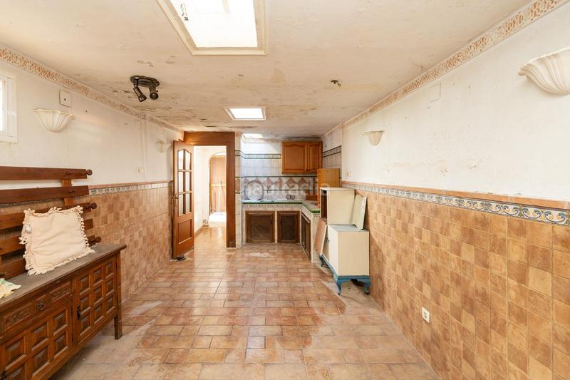 Foto 78f38125-3b7d-402e-8ad3-0edd63b4a01f. Casa adosada casa con encanto a reformar en plena cuesta del chapiz. patio, varias terrazas y mucho más en Granada