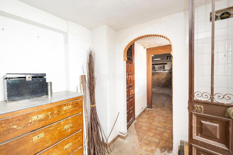Foto c36204e0-2943-4c6c-aec1-a74a5692176c. Casa adosada casa con encanto a reformar en plena cuesta del chapiz. patio, varias terrazas y mucho más en Granada