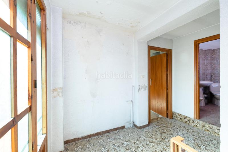 Foto c43c3160-7f27-4356-bfcb-47b7b48ec86b. Casa adosada casa con encanto a reformar en plena cuesta del chapiz. patio, varias terrazas y mucho más en Granada