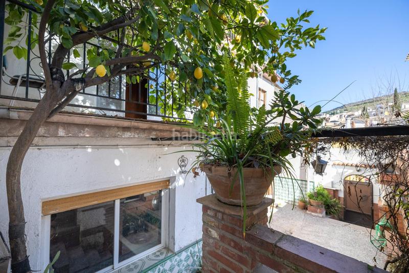 Foto e6dc83d8-28a5-4b6d-a843-82c831cc79db. Casa adosada casa con encanto a reformar en plena cuesta del chapiz. patio, varias terrazas y mucho más en Granada
