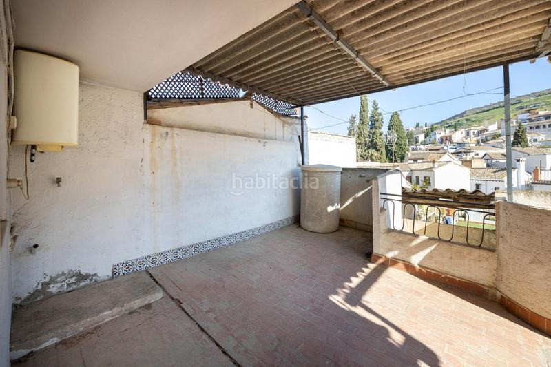 Foto f892f2b4-1448-4118-a718-d7d64a0fd2eb. Casa adosada casa con encanto a reformar en plena cuesta del chapiz. patio, varias terrazas y mucho más en Granada