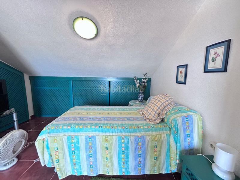 Foto e5e5af0b-344d-41cd-b3fb-24037e061c6a. Casa adossada amb calefacció aparcament a Montemar Torremolinos