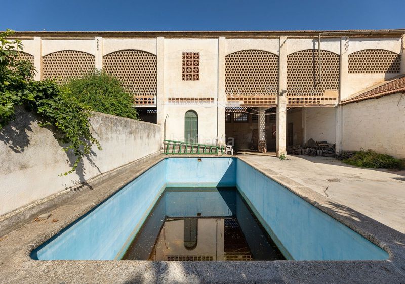 Foto d1e53157-6bf3-44d9-b332-6dcfd33ca611. Casa amb calefacció aparcament piscina a Atarfe