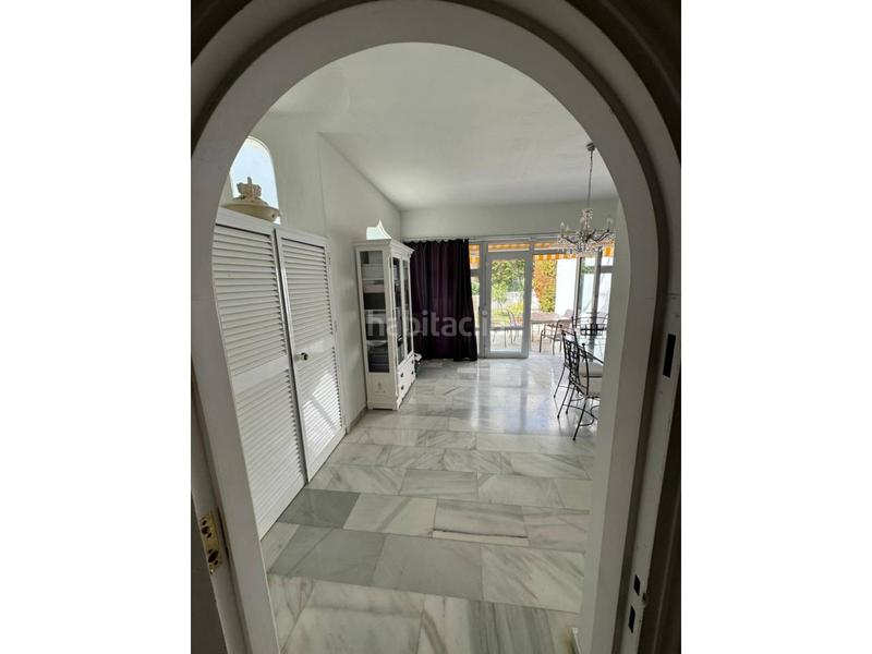 Foto e13da850-5e59-42c0-abc8-a4d13e7ce489. Casa adossada amb aparcament piscina a Hacienda Torrequebrada Benalmádena