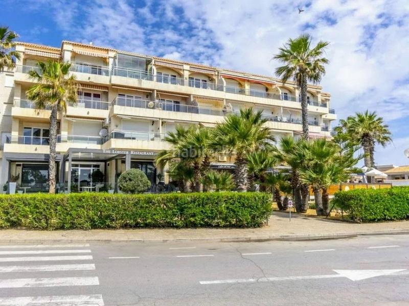 Foto b7ee6640-3042-4f0c-bb3c-a2f2781fa015. Apartamento 135 m de luz, espacio y mediterráneo en primera línea de costa en Orihuela