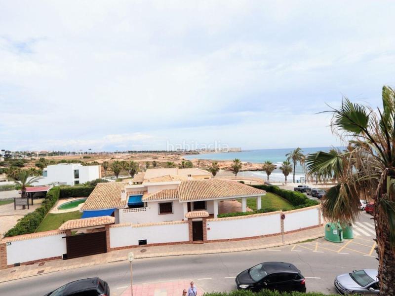 Foto f5278d58-c36f-4af1-ae99-ab0a7581abf7. Apartamento 135 m de luz, espacio y mediterráneo en primera línea de costa en Orihuela