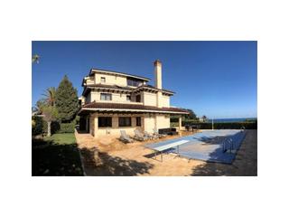 Haus  Avenida cabo el-cabo roig. Impresionante villa en primera línea de playa con piscina privad