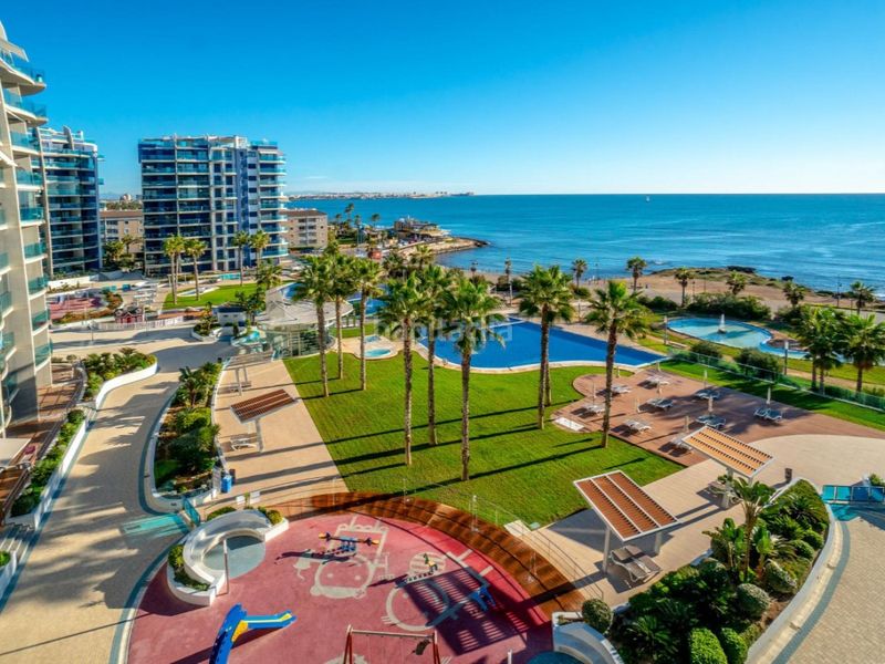 Foto 10162331-0e84-4e77-a2fe-4ea885f52896. Apartament amb aparcament piscina a Punta Prima Torrevieja