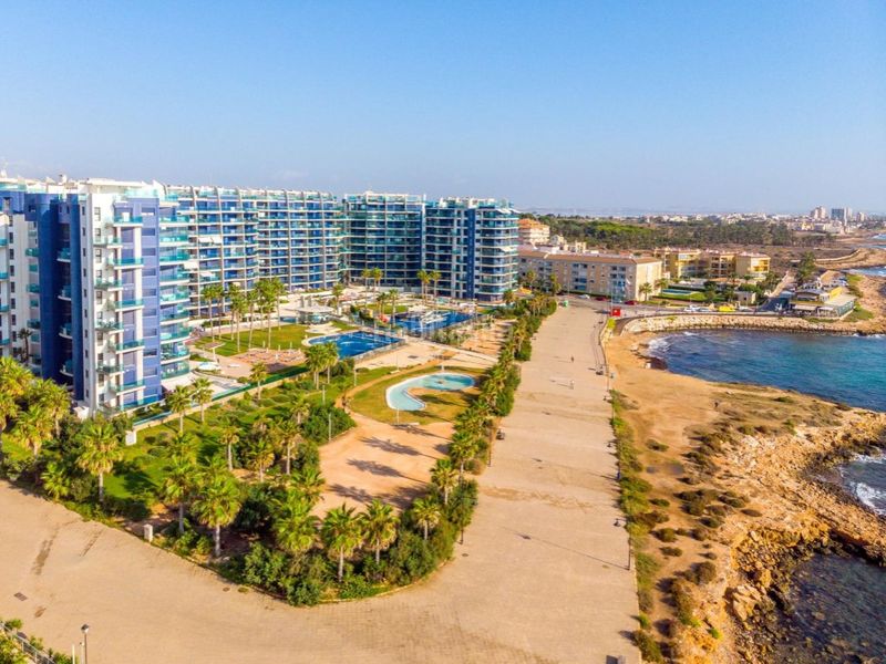 Foto 3c31c02c-52fe-4d38-90b7-ea3471a5db47. Apartament amb aparcament piscina a Punta Prima Torrevieja