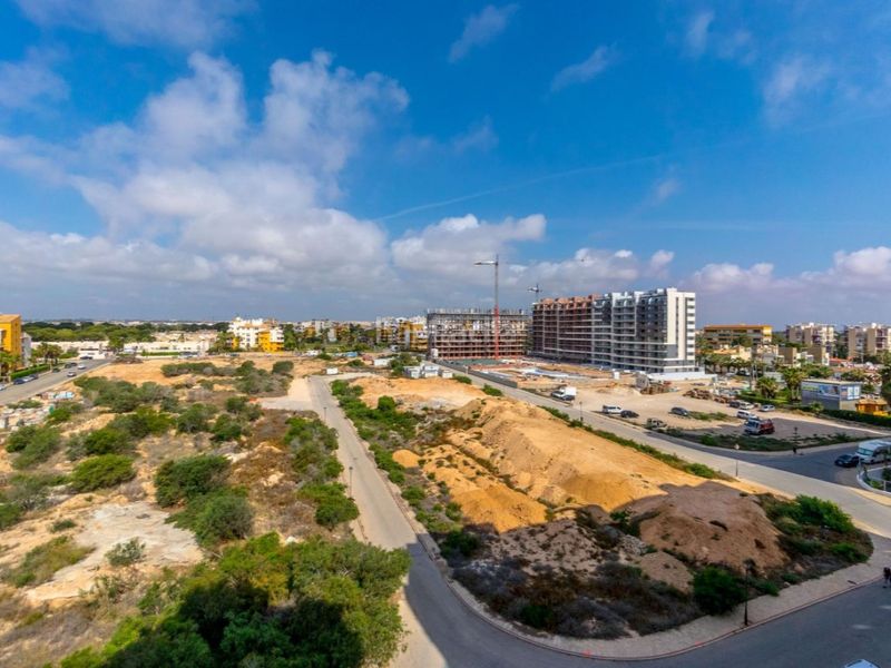 Foto 4c57a5a6-7b9f-4aee-94c7-5c543e4ea9bc. Apartament amb aparcament piscina a Punta Prima Torrevieja