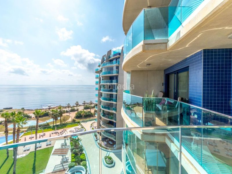 Foto 80b2a6d1-ba15-4653-81ef-9360292e46ae. Apartament amb aparcament piscina a Punta Prima Torrevieja