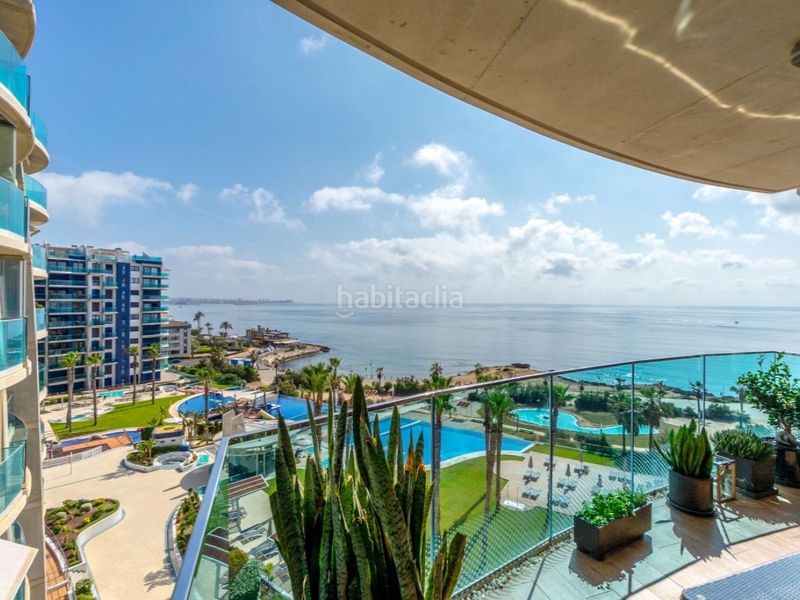 Foto 93672609-6503-4d6c-b076-cb8aa5395938. Apartament amb aparcament piscina a Punta Prima Torrevieja
