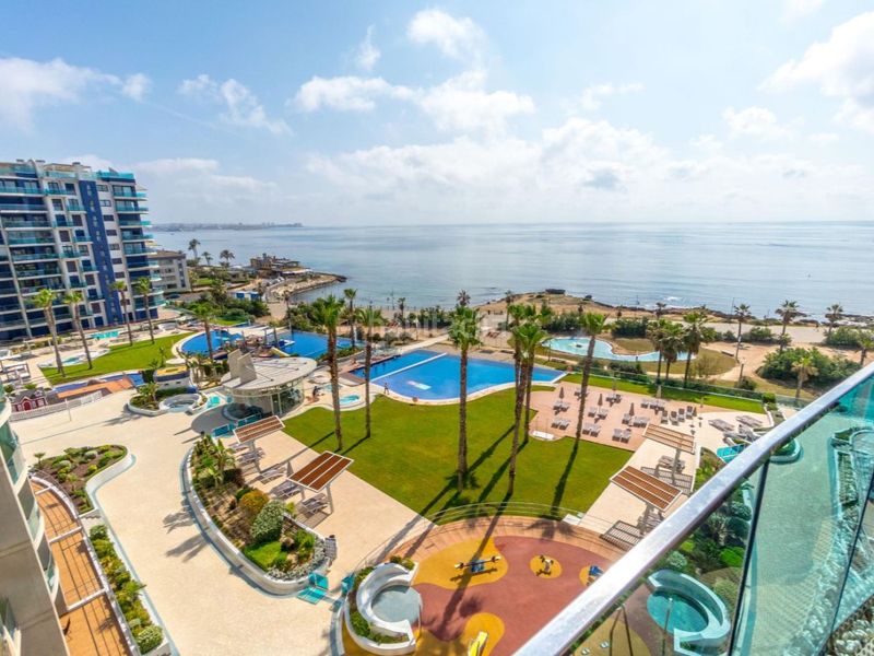 Foto 99bedcd9-56ac-41c5-a7f1-6e9e24a850ff. Apartament amb aparcament piscina a Punta Prima Torrevieja