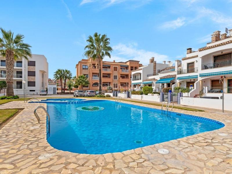 Foto 23271263-b5ad-432d-a056-f387377f20ce. Apartament amb aparcament piscina a Los Almendros Orihuela
