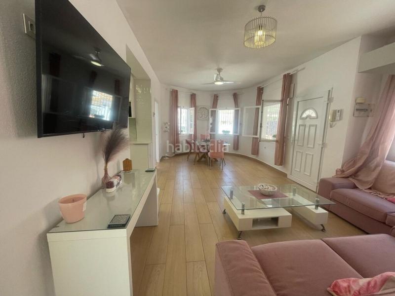 Foto c84ca4bb-f3a8-4dc1-baf9-962e872a88a2. Casa en urbanizacion p flamenca cl 4 12 villa de 5 dormitorios en Playa Flamenca en Orihuela