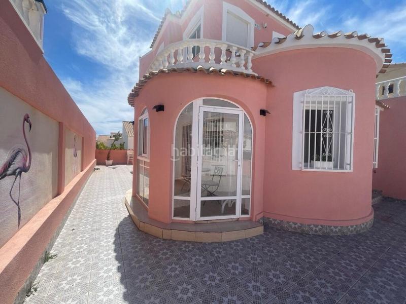 Foto ecc68e8d-912b-4558-a938-8627a873de99. Casa en urbanizacion p flamenca cl 4 12 villa de 5 dormitorios en Playa Flamenca en Orihuela