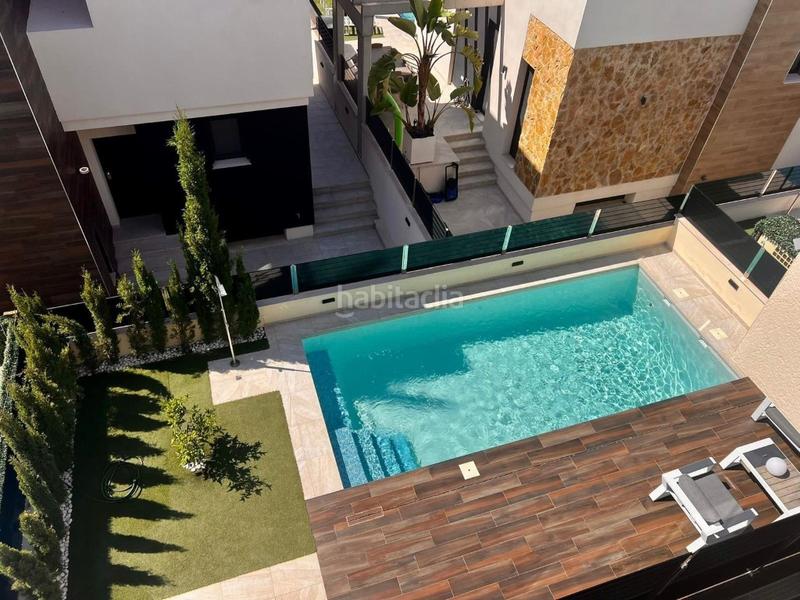Foto 29ffd3f6-df08-4afb-84dc-4010292e71b3. Casa villa de lujo en lomas de cabo roig con piscina y jardín privado en Orihuela