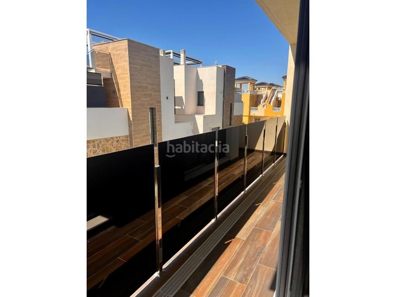 Foto a10587eb-4d67-4af0-aef7-c2e30c86f8ea. Casa villa de lujo en lomas de cabo roig con piscina y jardín privado en Orihuela