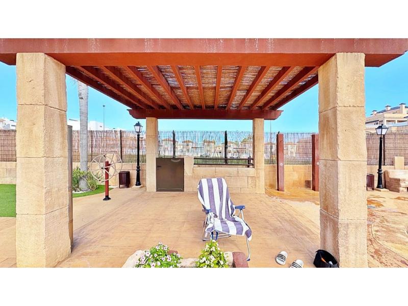 Foto bb54bd7c-8e9b-40bb-ab74-c7aefe6dfce3. Casa a schiera con parcheggio in Villamartín-Las Filipinas Orihuela