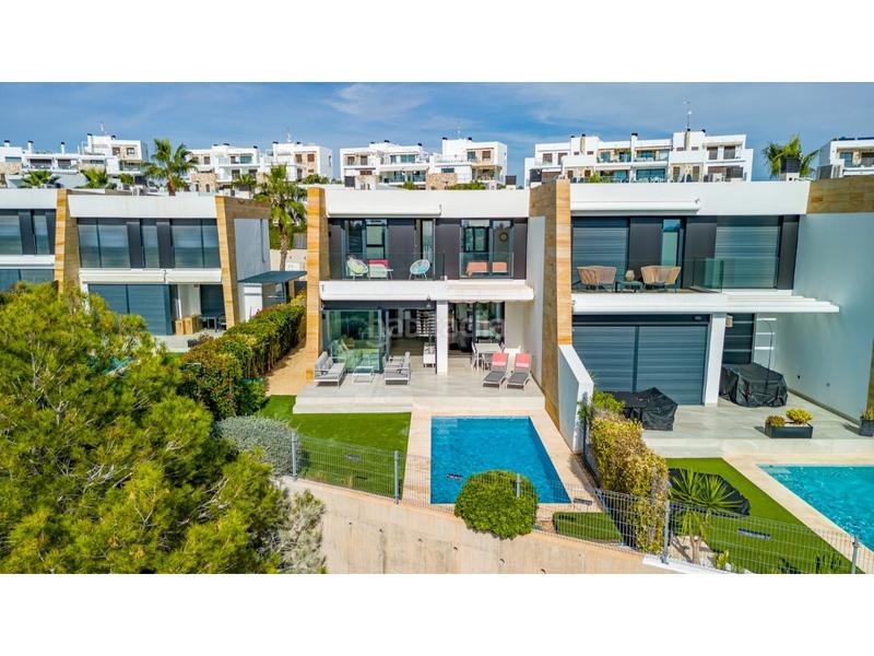 Foto 9db3228f-522d-401d-a51e-45fd463616e3. Casa amb aparcament piscina a Villamartín-Las Filipinas Orihuela