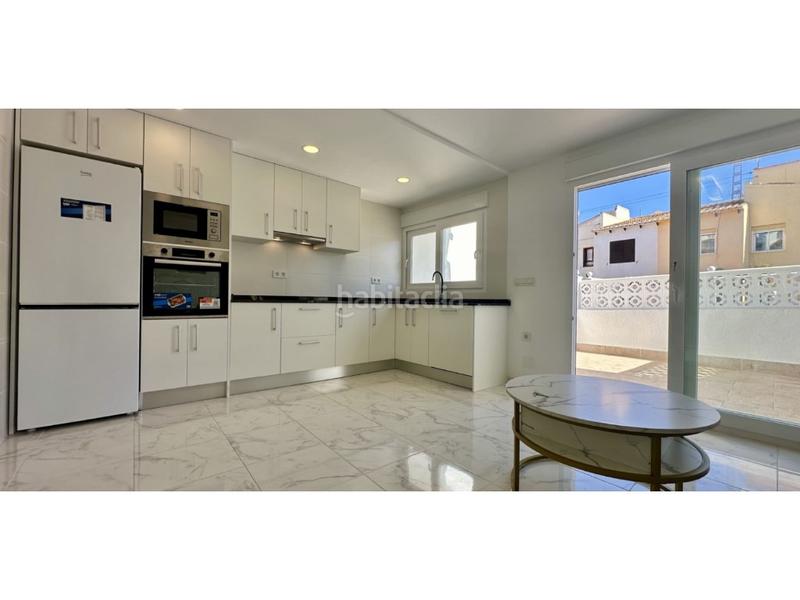 Foto 76d6a291-3e65-4ec1-baf8-32342b2e5b28. Casa adossada a Los Balcones-Los Altos Torrevieja