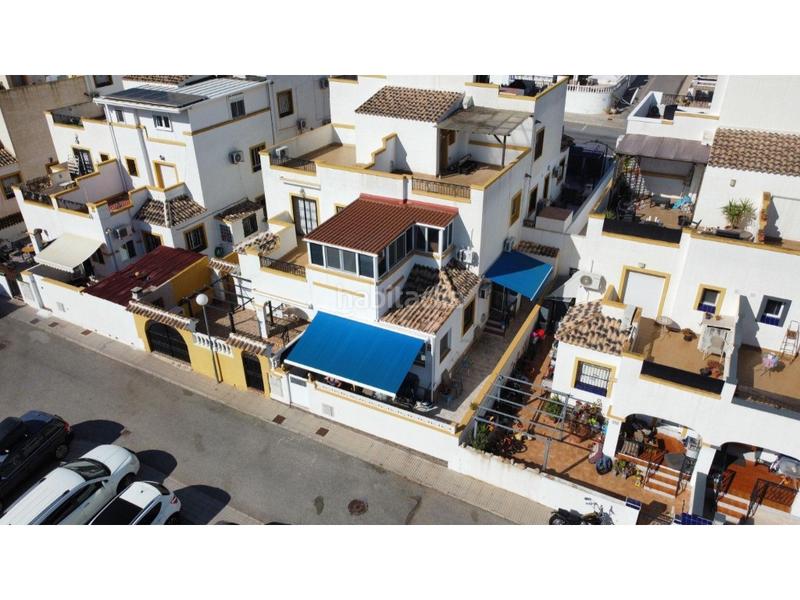 Foto 4bb88061-3597-4e46-aaf7-ad6243fabc72. Casa a schiera con piscina in La Florida Orihuela