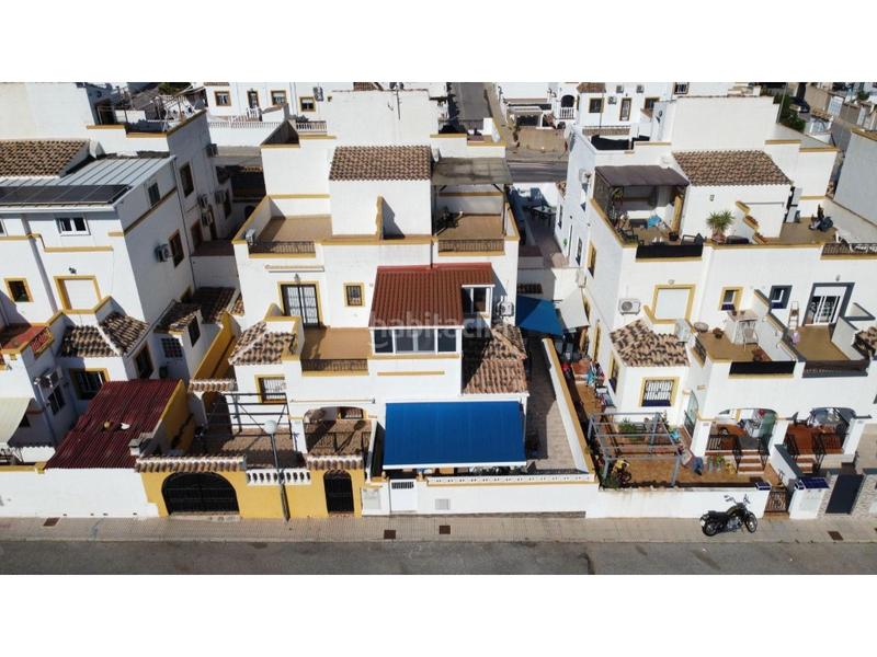 Foto ed6fa7ff-e3a0-4ca8-a302-0c6bec8c4c86. Casa a schiera con piscina in La Florida Orihuela