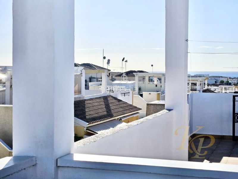 Foto 37805132-a175-4647-b1c5-f15c936ef523. Casa a Punta Prima Orihuela