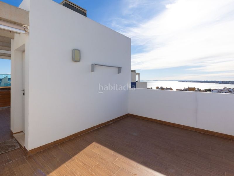 Foto d82c7708-86be-4f56-aa86-e02b66141698. Àtic amb aparcament a Punta Prima Torrevieja