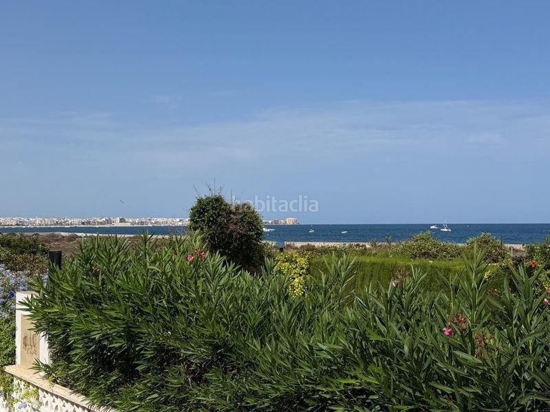 Foto 07335834-8b81-4b69-ad4e-c5314817401e. Casa amb piscina a Punta Prima Torrevieja