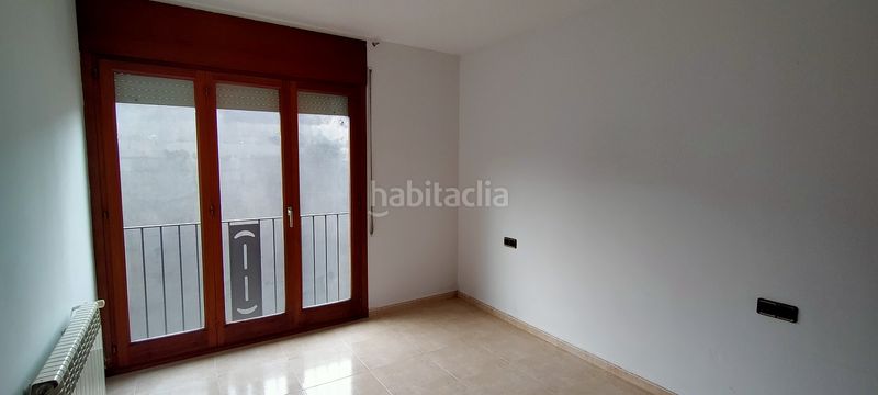 Foto 1e17f139-080f-4a52-aca1-dc1416a5d8b7. Casa a schiera con camino in Olot