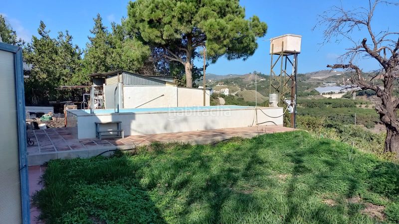 Foto 57fc8e25-ab44-4cbe-8740-8840d87a9329. Finca rústica a Almayate Bajo