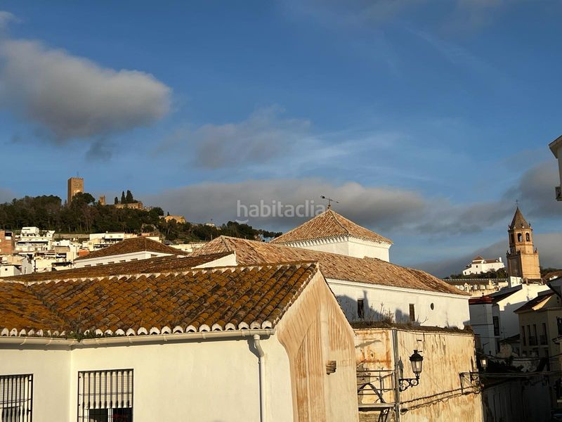 Foto aca15df4-9953-48c1-9c0f-5a07c5fff76d. Casa adossada amb xemeneia a Centro Ciudad - El Carmen Vélez - Málaga