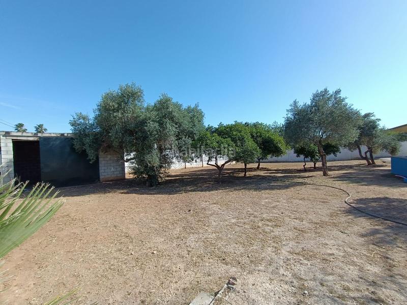 Foto ce649b66-a6ef-41c2-977e-98606d2f94c3. Finca rústica a La Hacienda - Nueva Andalucía Dos Hermanas