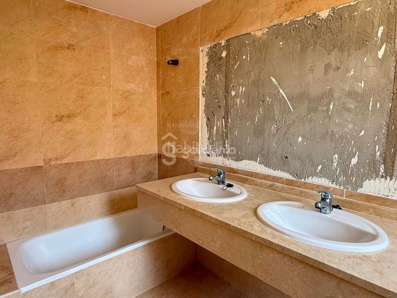 Foto cea7c5ba-c43b-4c4a-a72a-8a45c6379ee6. Casa  en venta con piscina comunitaria en Espartinas pueblo Espartinas