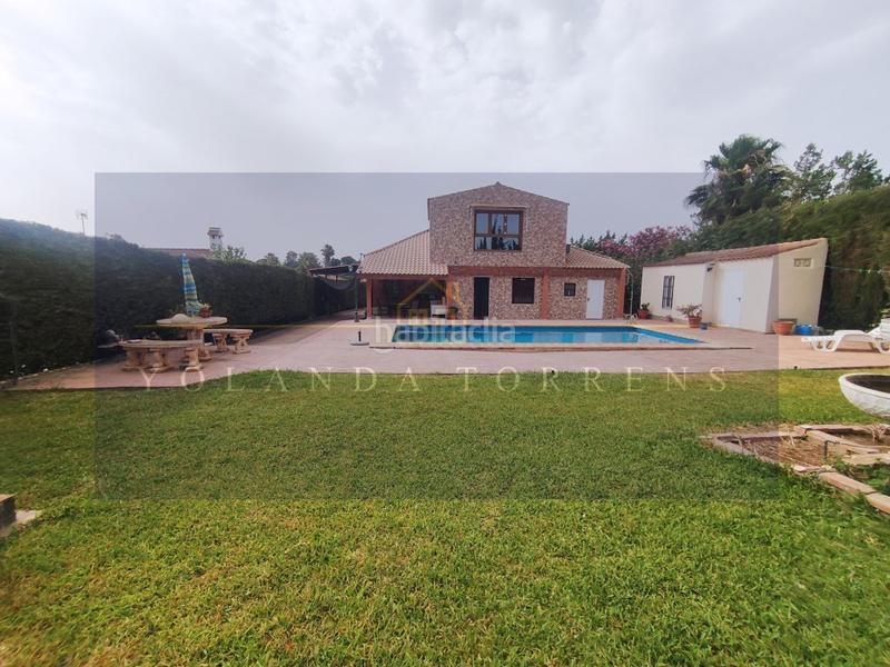 Foto d79ab98d-107c-4b90-b848-cce026244328. Chalet mit parking pool in La Paz Alcalá de Guadaira
