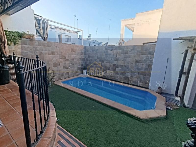 Foto e8398602-7e99-41c2-82d4-b73902cec011. Casa amb aparcament piscina a Oromana Alcalá de Guadaira